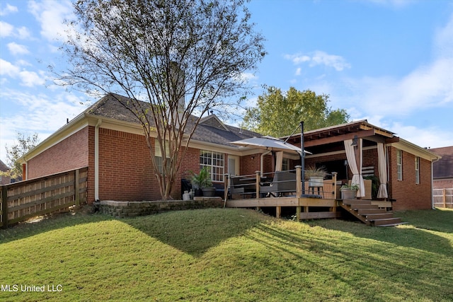 9948 Victor Dr, Olive Branch, MS 38654 - back of house featuring brick siding and a deck