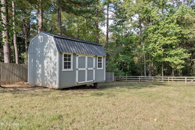 9948 Victor Dr, Olive Branch, MS 38654 - view of shed with view of wooded area