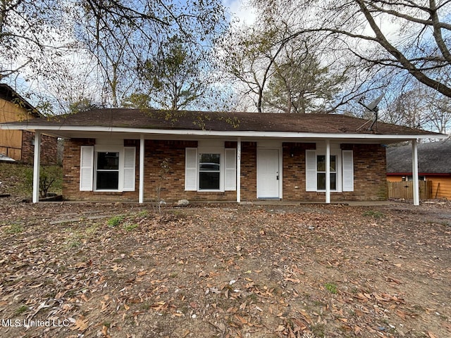 ranch-style home with covered porch