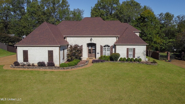 view of front of house with a front yard