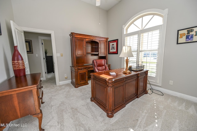 office space featuring light colored carpet