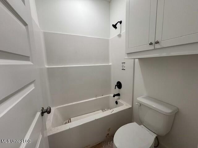 bathroom with shower / bathtub combination and toilet