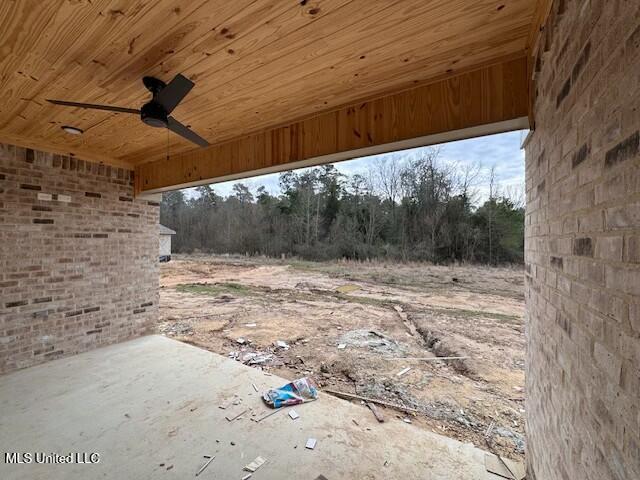 view of patio / terrace featuring ceiling fan