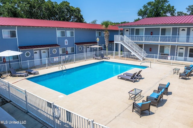 view of pool with a patio area