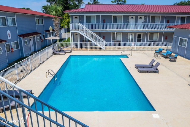 view of pool with a patio