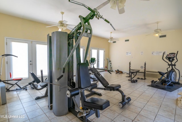 workout area featuring french doors and light tile patterned flooring