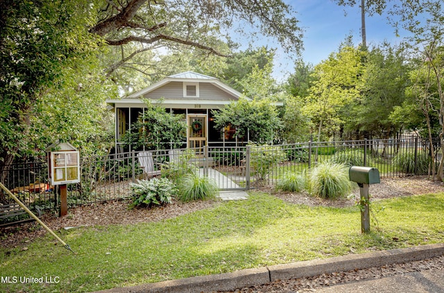 319 Washington Ave, Ocean Springs, MS 39564 - view of front of house with a gate
