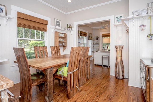 319 Washington Ave, Ocean Springs, MS 39564 - dining room with crown molding, wood finished floors, a ceiling fan, and recessed lighting