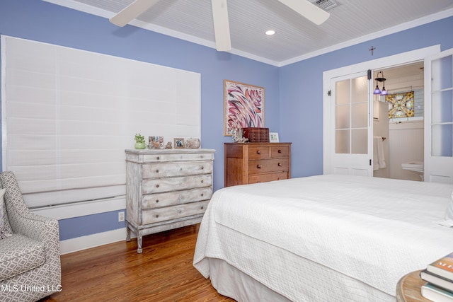 319 Washington Ave, Ocean Springs, MS 39564 - bedroom featuring wood finished floors, recessed lighting, baseboards, and crown molding