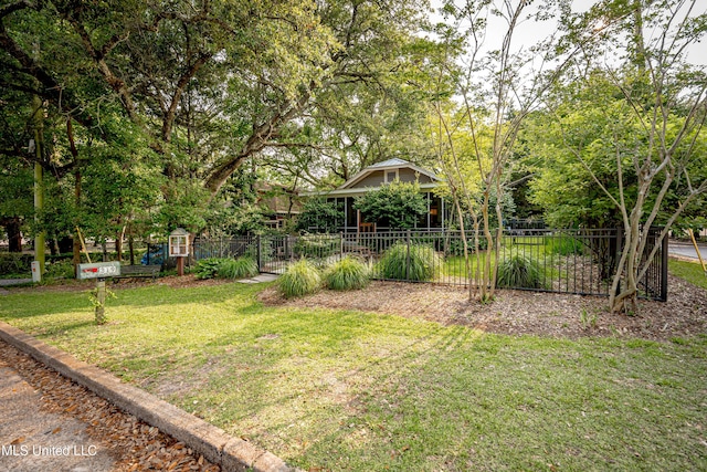 319 Washington Ave, Ocean Springs, MS 39564 - view of yard featuring a gate