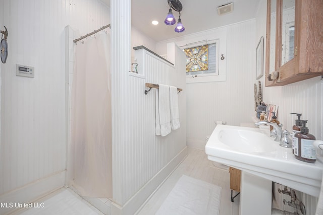 319 Washington Ave, Ocean Springs, MS 39564 - bathroom with curtained shower
