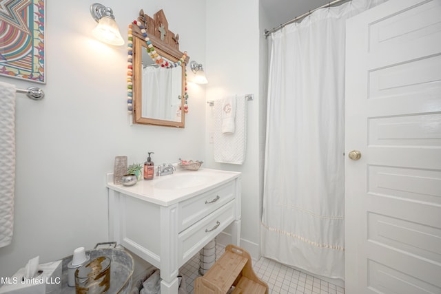 319 Washington Ave, Ocean Springs, MS 39564 - bathroom featuring vanity, tile patterned floors, and a shower with curtain