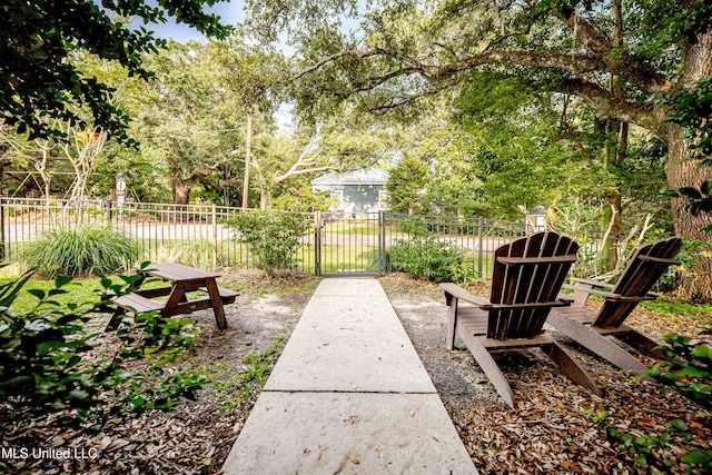 319 Washington Ave, Ocean Springs, MS 39564 - view of yard featuring a gate