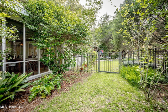 319 Washington Ave, Ocean Springs, MS 39564 - view of yard featuring a gate