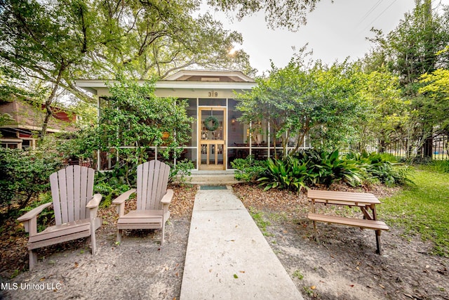 319 Washington Ave, Ocean Springs, MS 39564 - view of patio / terrace with a sunroom and french doors