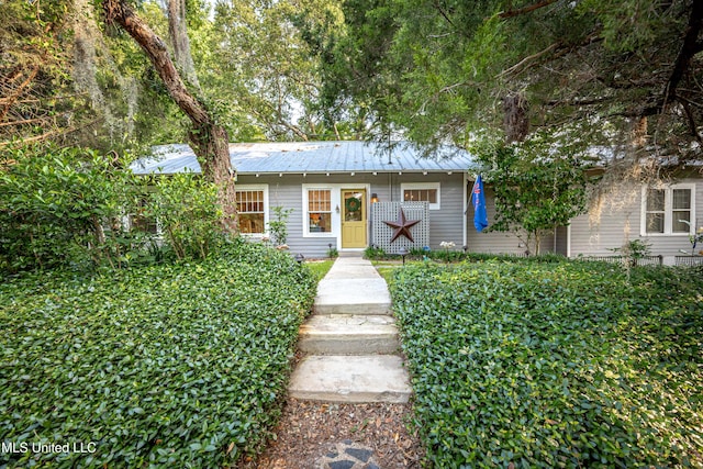319 Washington Ave, Ocean Springs, MS 39564 - view of front of property with metal roof