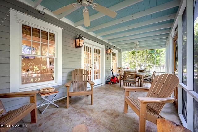 319 Washington Ave, Ocean Springs, MS 39564 - covered porch featuring ceiling fan and outdoor dining area