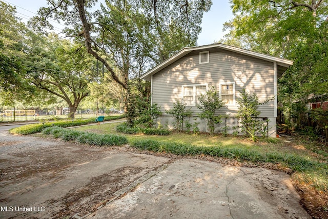 319 Washington Ave, Ocean Springs, MS 39564 - view of property exterior with a patio area