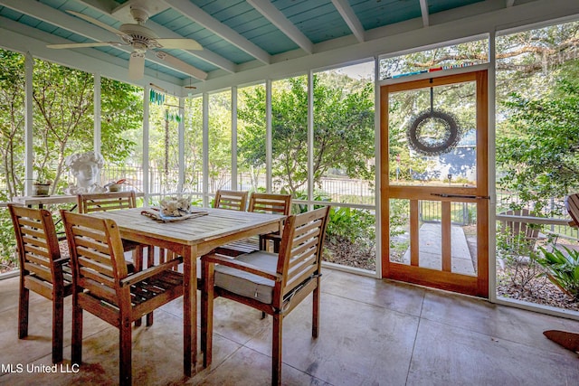 319 Washington Ave, Ocean Springs, MS 39564 - sunroom / solarium featuring a ceiling fan, outdoor dining space, and beam ceiling