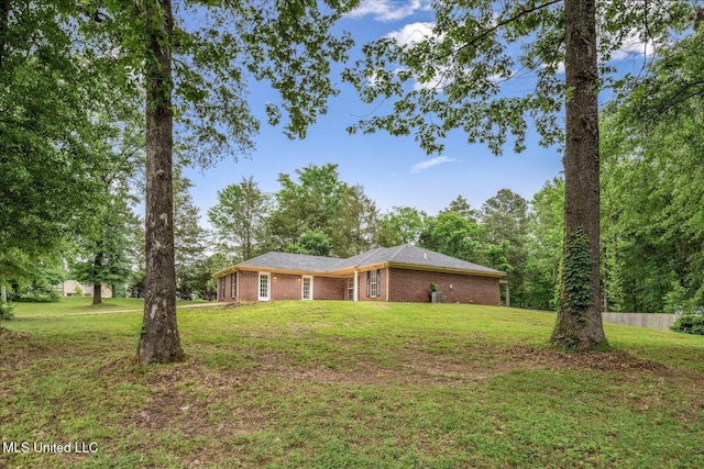 119 Vance Cv, Byhalia, MS 38611 - view of front of house with a front lawn and brick siding