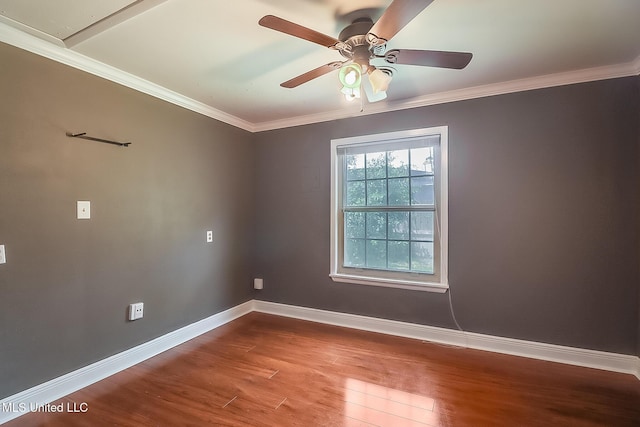 spare room with ceiling fan, ornamental molding, and hardwood / wood-style flooring