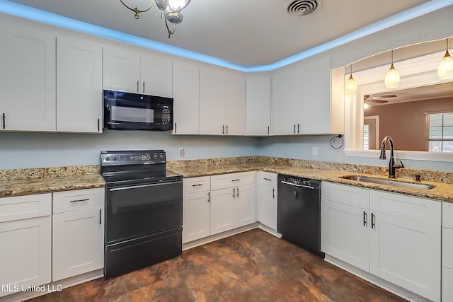 kitchen with ceiling fan, sink, black appliances, white cabinetry, and hanging light fixtures