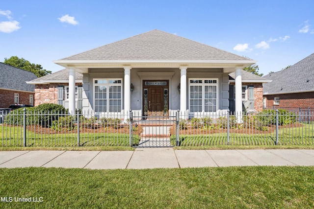 view of front of home with a front yard