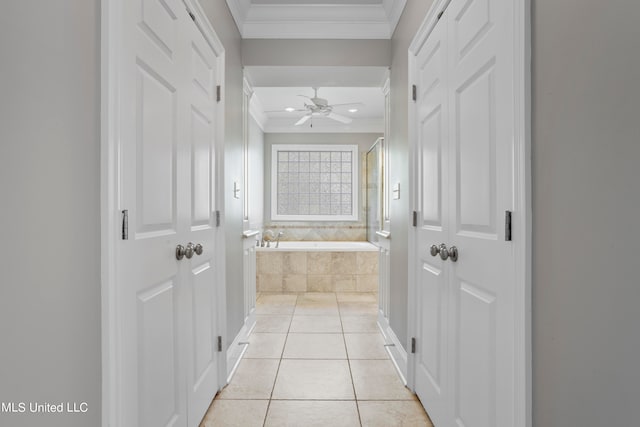 bathroom featuring ceiling fan, crown molding, tile patterned floors, and separate shower and tub