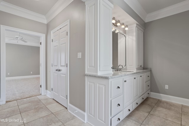 bathroom featuring vanity, ceiling fan, ornamental molding, and tile patterned flooring