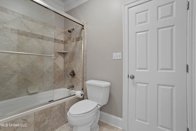 bathroom featuring toilet, combined bath / shower with glass door, ornamental molding, and tile patterned floors