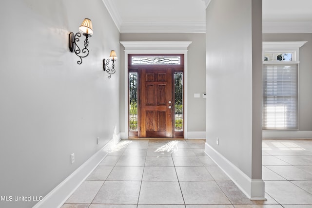 foyer featuring ornamental molding and light tile patterned floors