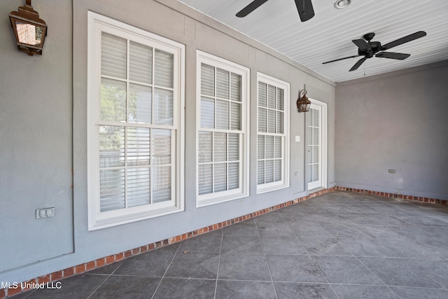 view of patio / terrace featuring ceiling fan