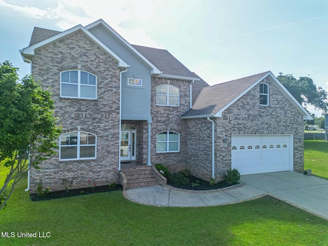 103 Buena Vista Dr, Long Beach, MS 39560 - traditional-style house featuring concrete driveway, a front yard, and a shingled roof