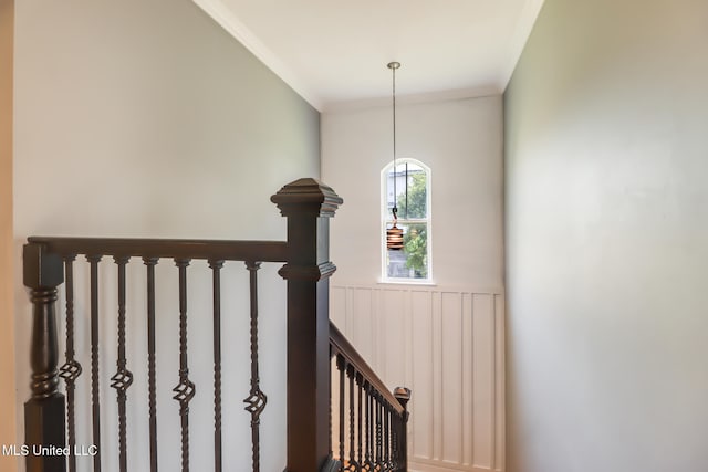 103 Buena Vista Dr, Long Beach, MS 39560 - stairs featuring ornamental molding, a wainscoted wall, and a decorative wall