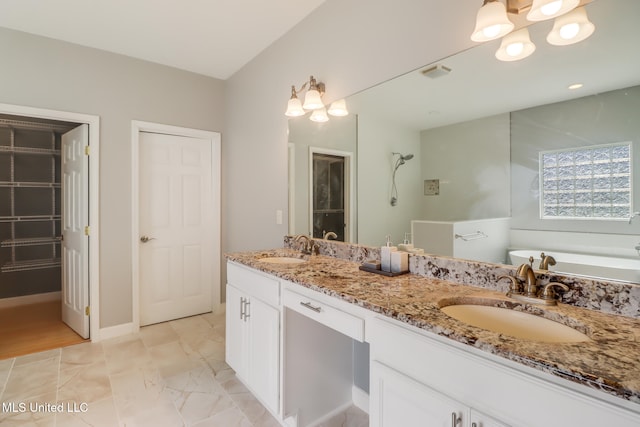 103 Buena Vista Dr, Long Beach, MS 39560 - bathroom with double vanity and a tub