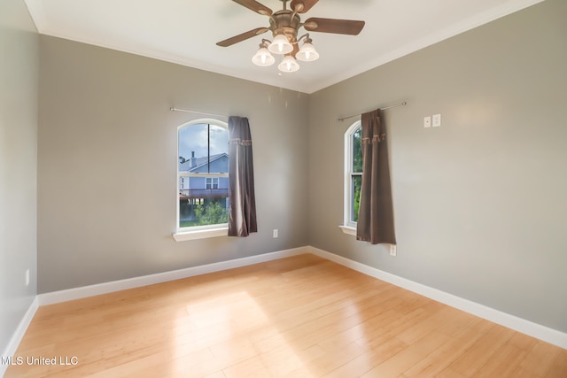 103 Buena Vista Dr, Long Beach, MS 39560 - unfurnished room featuring plenty of natural light, wood finished floors, and ceiling fan