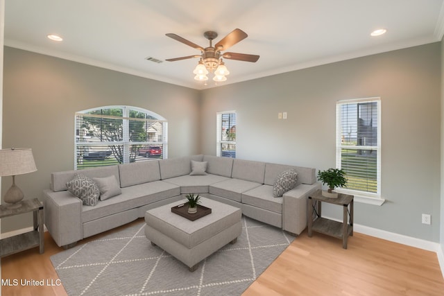 103 Buena Vista Dr, Long Beach, MS 39560 - living area featuring a ceiling fan, wood finished floors, recessed lighting, and crown molding