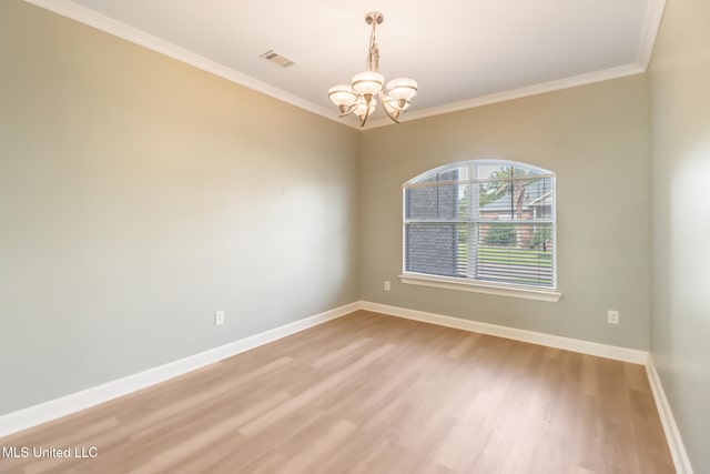 103 Buena Vista Dr, Long Beach, MS 39560 - unfurnished room with a chandelier, light wood-style flooring, and crown molding