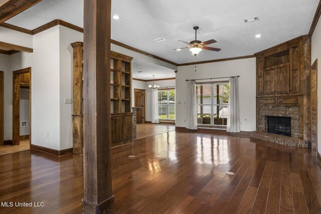 221 Penny Ln, Brandon, MS 39042 - unfurnished living room featuring hardwood / wood-style floors, a ceiling fan, crown molding, a fireplace, and baseboards