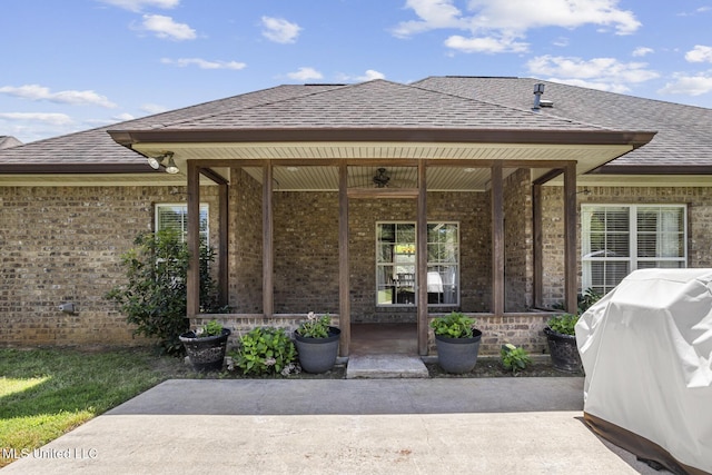 221 Penny Ln, Brandon, MS 39042 - view of exterior entry with brick siding and roof with shingles