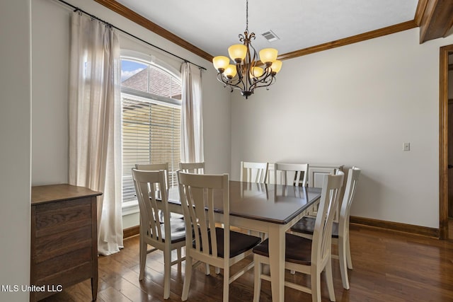 221 Penny Ln, Brandon, MS 39042 - dining space with ornamental molding, a chandelier, dark wood-type flooring, and baseboards