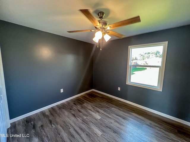 empty room with wood-type flooring and ceiling fan