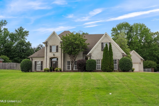 4293 Trumpington Cv, Southaven, MS 38672 - view of front of house with roof with shingles, brick siding, and a garage