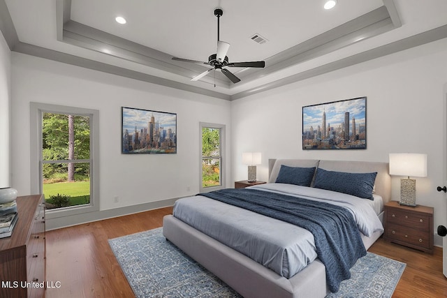 103 Grayson Way, Madison, MS 39110 - bedroom with a tray ceiling, multiple windows, wood finished floors, baseboards, and recessed lighting