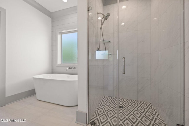 bathroom with plus walk in shower and tile patterned floors