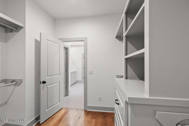 103 Grayson Way, Madison, MS 39110 - walk in closet with wood finished floors