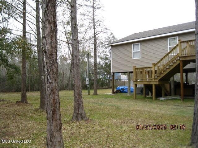 view of yard featuring a deck