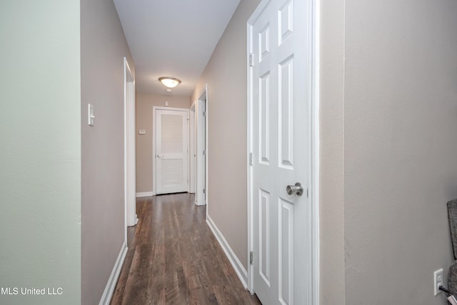 2421 Beachview Dr Unit H2, Ocean Springs, MS 39564 - hallway featuring dark wood-style flooring and baseboards