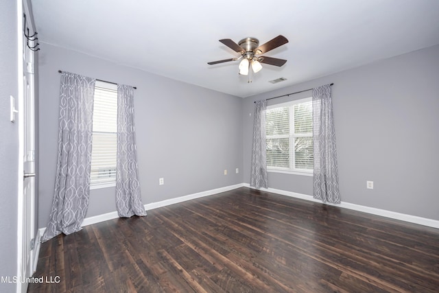 2421 Beachview Dr Unit H2, Ocean Springs, MS 39564 - spare room with a ceiling fan, wood finished floors, and baseboards