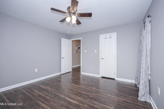2421 Beachview Dr Unit H2, Ocean Springs, MS 39564 - unfurnished bedroom featuring baseboards, wood finished floors, and ceiling fan